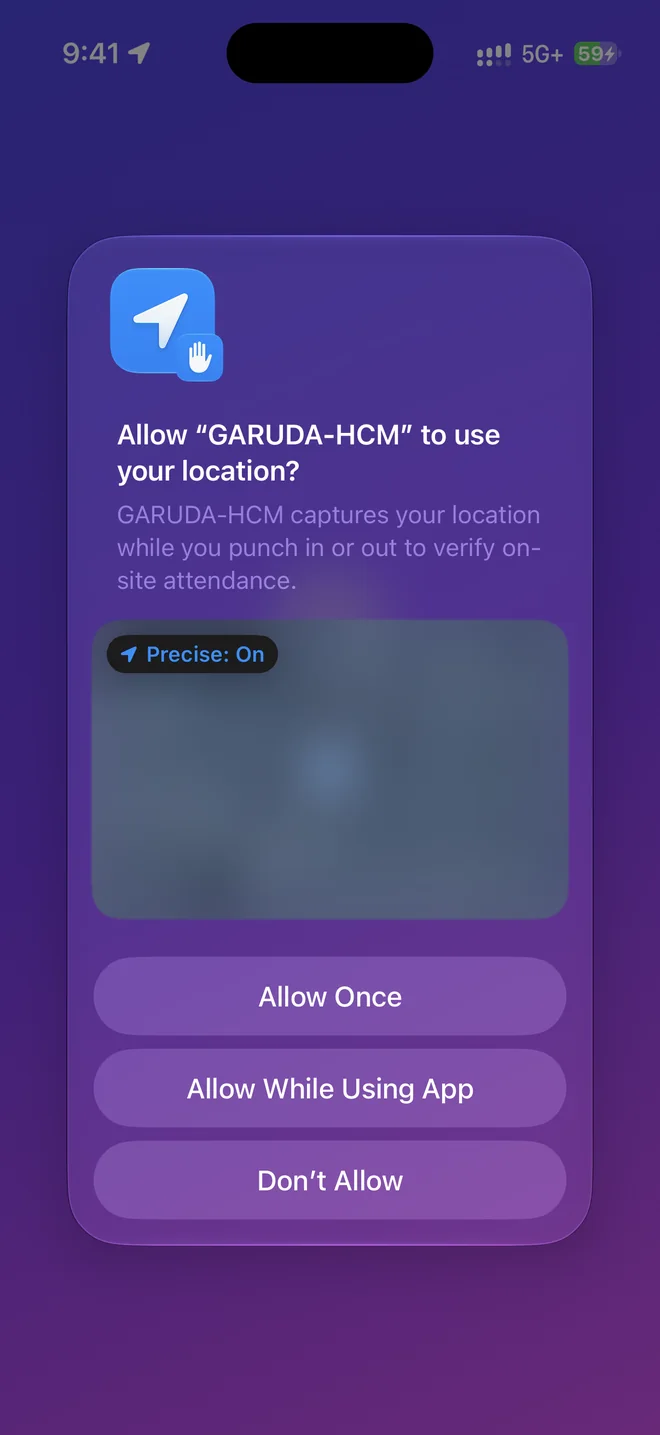 The iPhone asking whether GARUDA-HCM may use your location, with Precise: On, Allow Once, Allow While Using App and Don’t Allow. The map is blurred on this page.