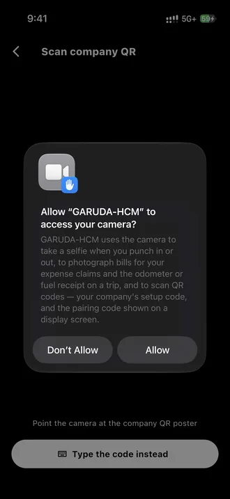 The iPhone asking whether GARUDA-HCM may access the camera, over the Scan company QR screen, with Don’t Allow and Allow.